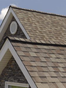 View of a home's roof made of asphalt shingles